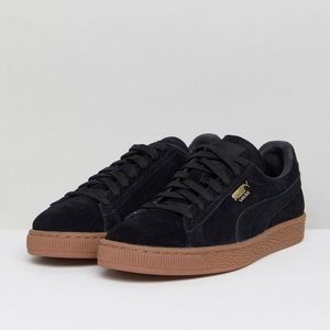 Black & Gold suede pumas